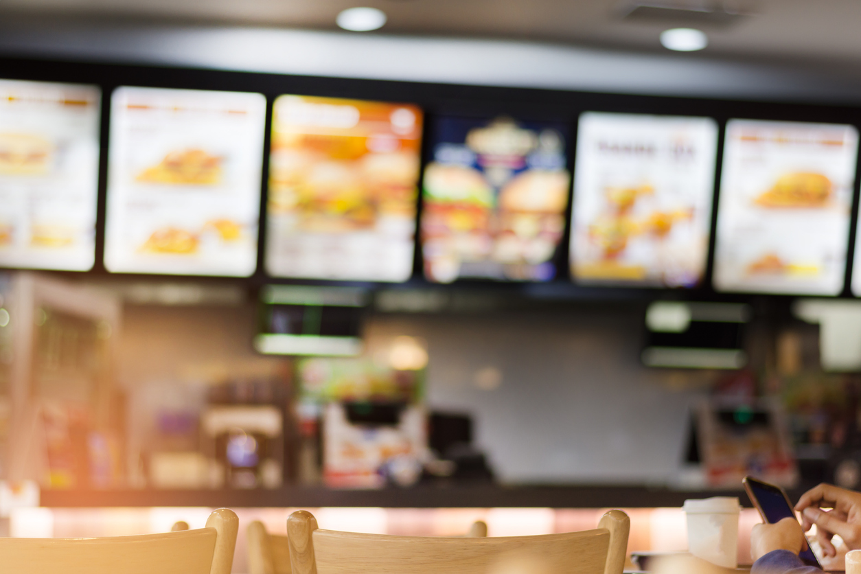 Photo of a Restaurant Brand menu and cashier 